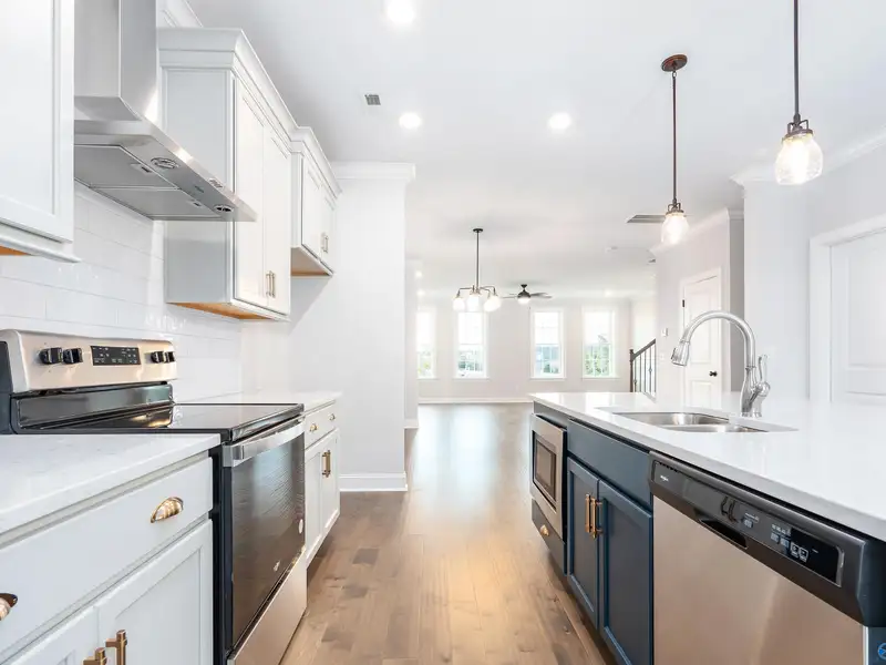 Live/work Townhome with Flex Space, Gourmet Kitchen, and 2-car Garage in Prime Location