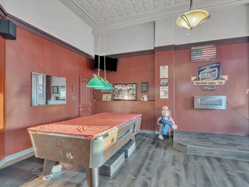 Versatile Corner Commercial Property with Retail Space and Two Apartments in Prime Location