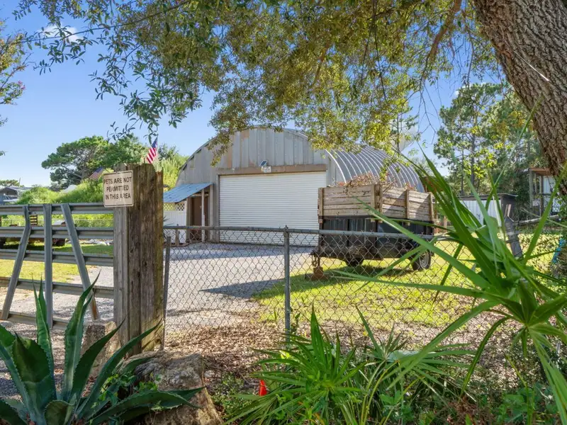30x30 Enclosed Quonset Building with Pole Barn and Storage on Hwy 98
