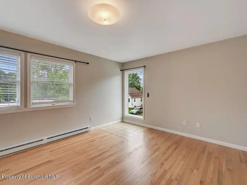 Mixed-use Property in Throop: 7-bay Garage and Updated 2-bedroom Apartment