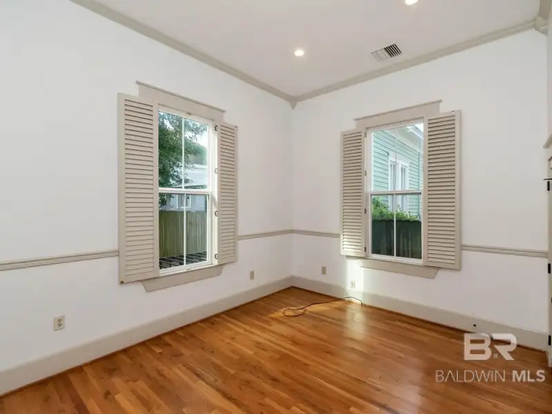 Mixed-use Property in Downtown Mobile, Alabama with High Ceilings and Hardwood Floors