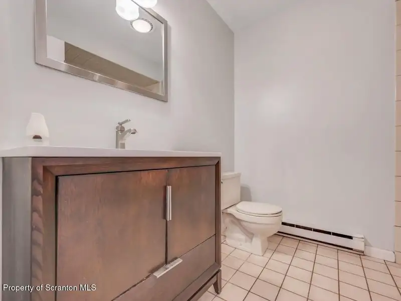 Mixed-use Property in Throop: 7-bay Garage and Updated 2-bedroom Apartment