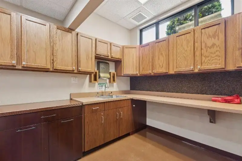 Versatile Commercial Condo for Sale Near Hwy 151 & 41 with Multiple Offices and Amenities