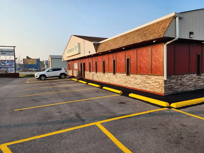 Turnkey Restaurant and Bar with Income-generating Tenants on Prime .62-acre Lot