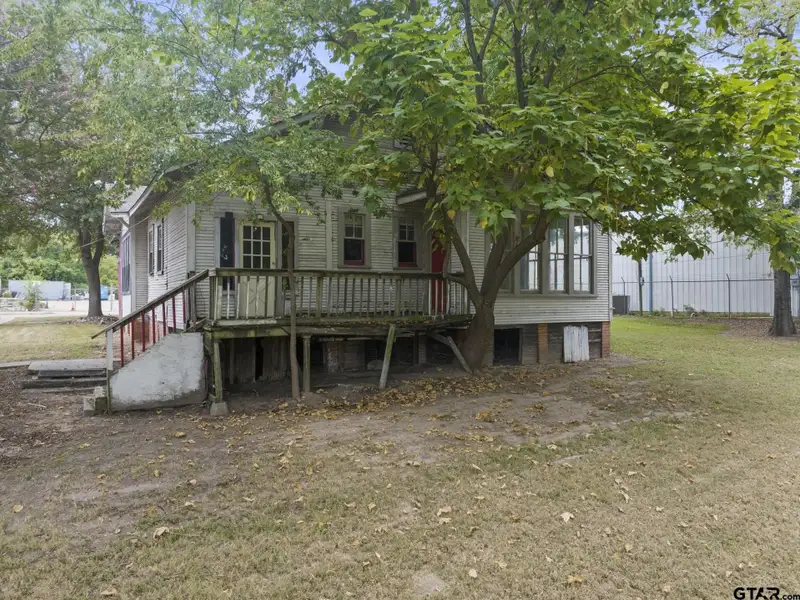 Prime Commercial Property with Building and Home on Half Acre Lot