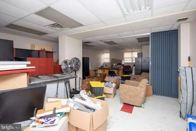 Versatile 6,000 Sq Ft Commercial Space in Prime Location with Parking Potential