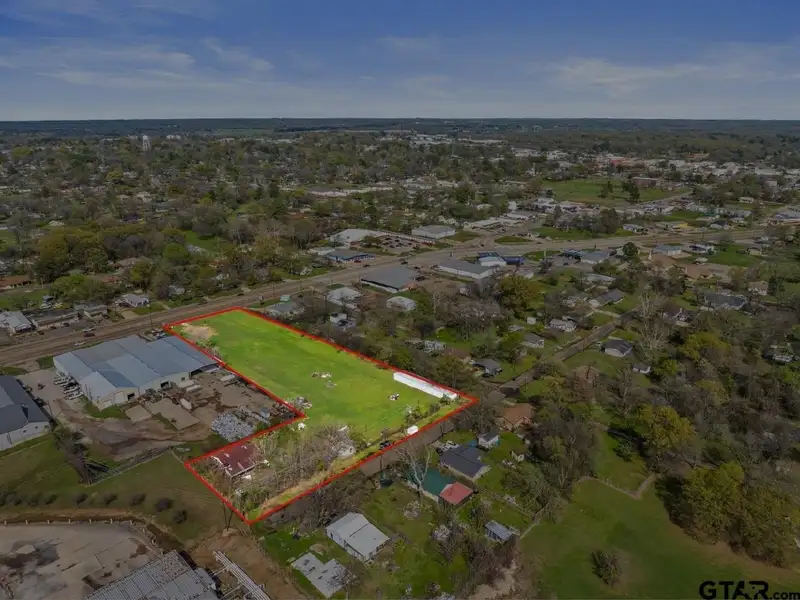 2-acre Commercial Property with Storage Units and Dual Road Frontage