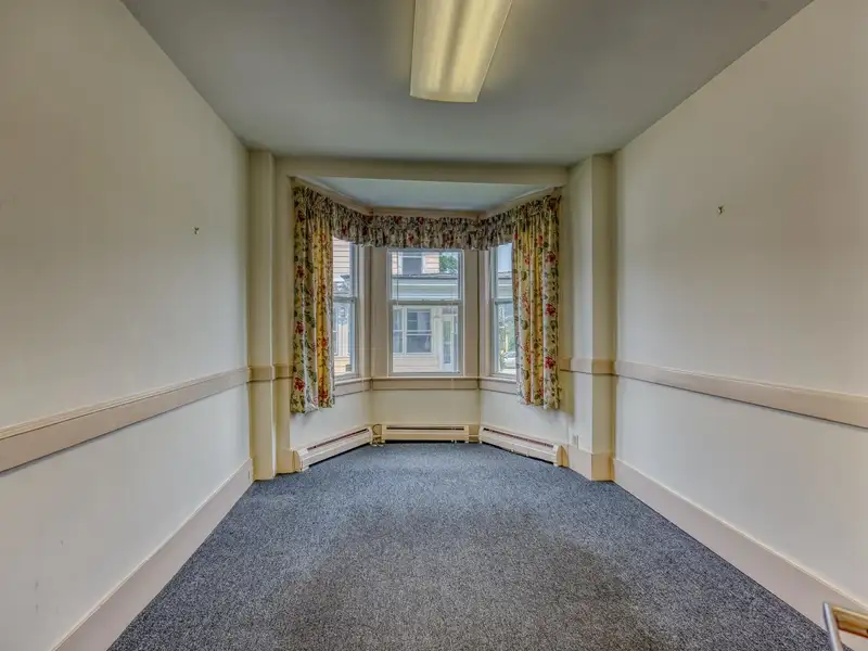 Versatile Mixed-use Property on Cottage Street, Littleton with Office Spaces and Barn