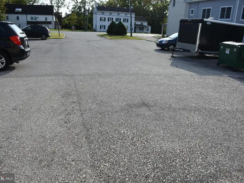 Versatile 3000+ Sq Ft Commercial Space in Prime Village Location with Auto Repair Facilities