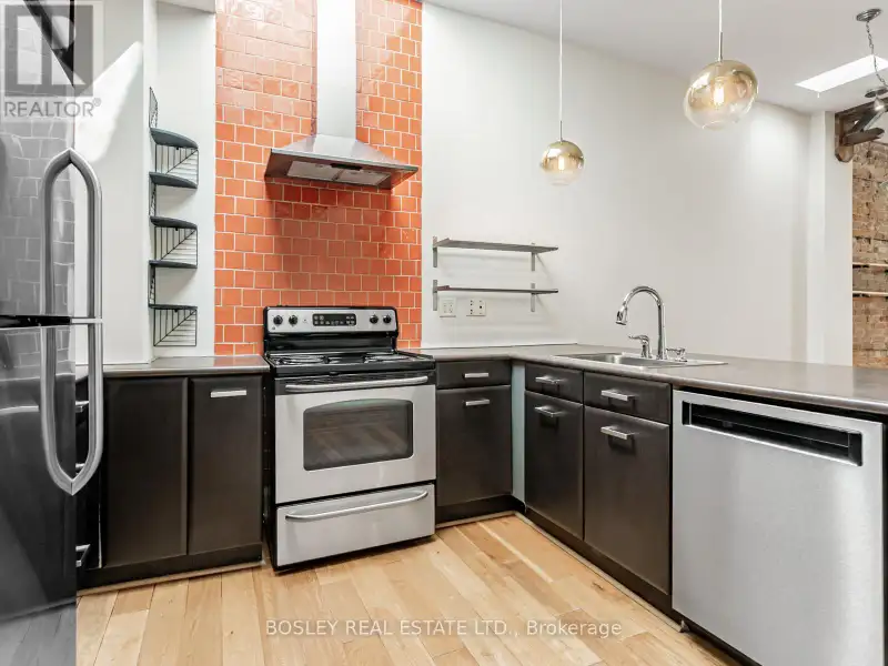 Charming Two-storey Apartment in Landmark Building on Queen St West