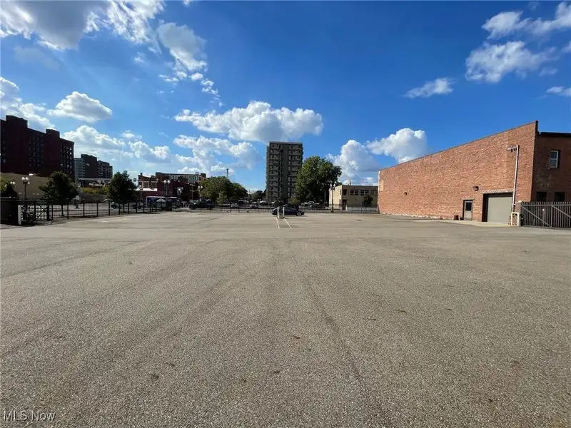 Well-maintained Two-story Brick Building with Retail and Workshop Space in Ne Location
