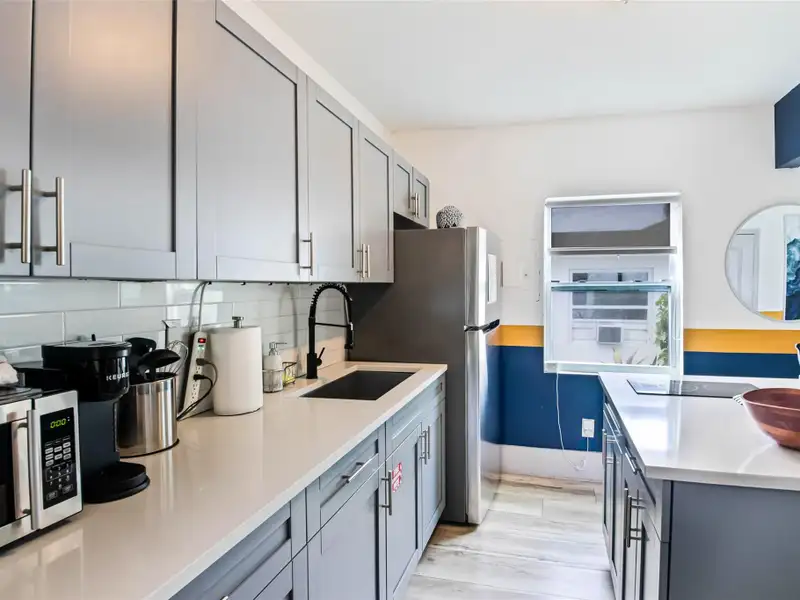 Fully Renovated Five-plex in Victoria Park with Development Potential and Strong Income.