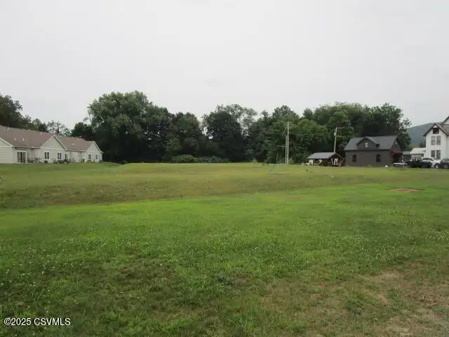 Partially Built Condo Development with Approved Plans in Picturesque Location