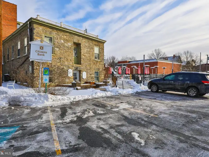 Historic Multi-use Building in Chestnut Hill Business District with Retail and Residential Units