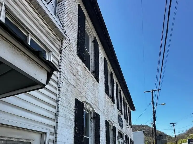 Large Commercial Building with Unique Floor Plan and Adjacent City-owned Lot for Sale