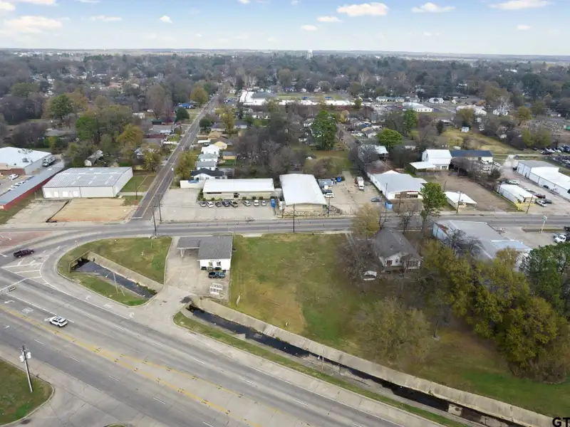 Prime Commercial Property with Building and Home on Half Acre Lot