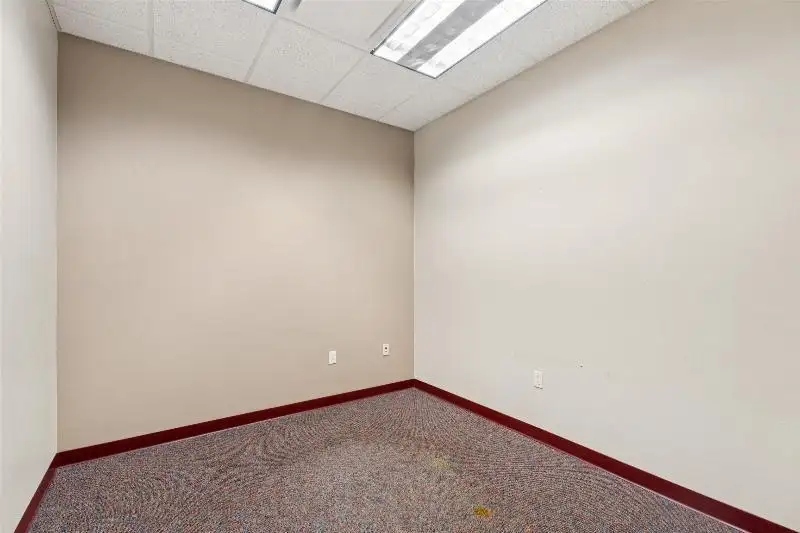 Versatile Commercial Condo for Sale Near Hwy 151 & 41 with Multiple Offices and Amenities