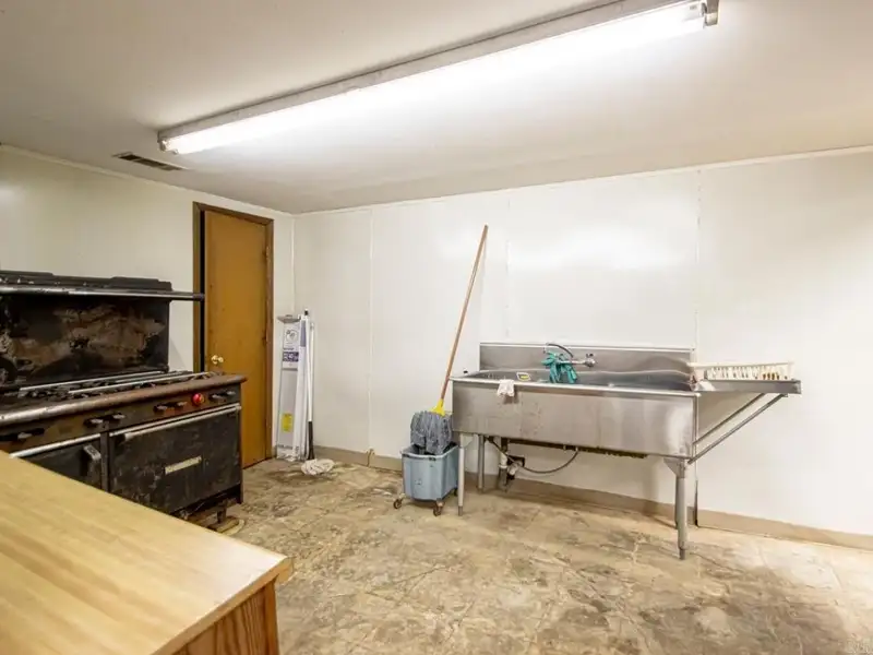 Office Space with Meeting Area, Kitchen, and Security Features in Convenient Location