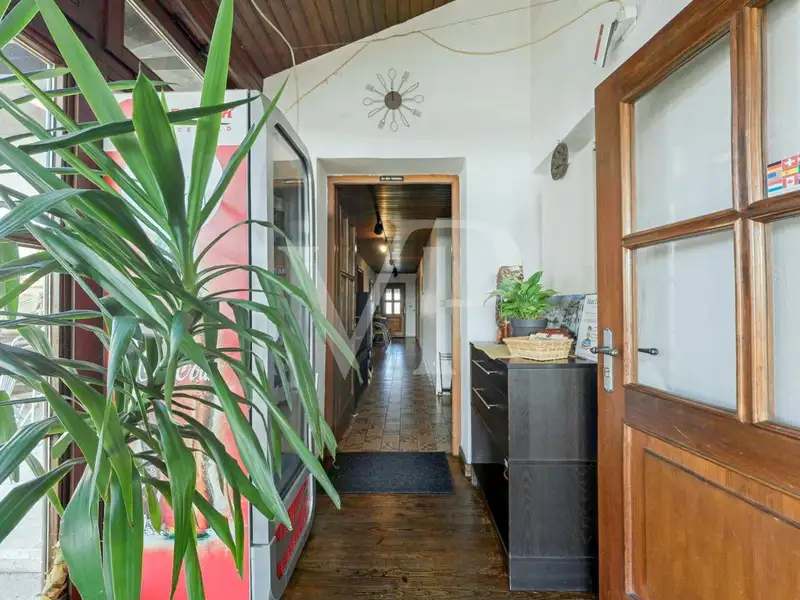 Versatile Residential and Commercial Building with Restaurant in Münchsmünster