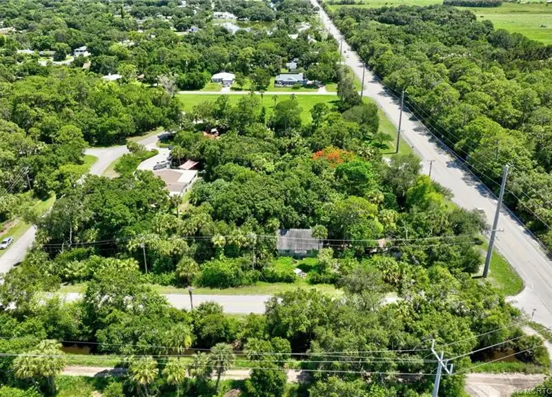 Commercial Corner Lot with Existing Residence in Lakewood Park, 31,140 Sq Ft