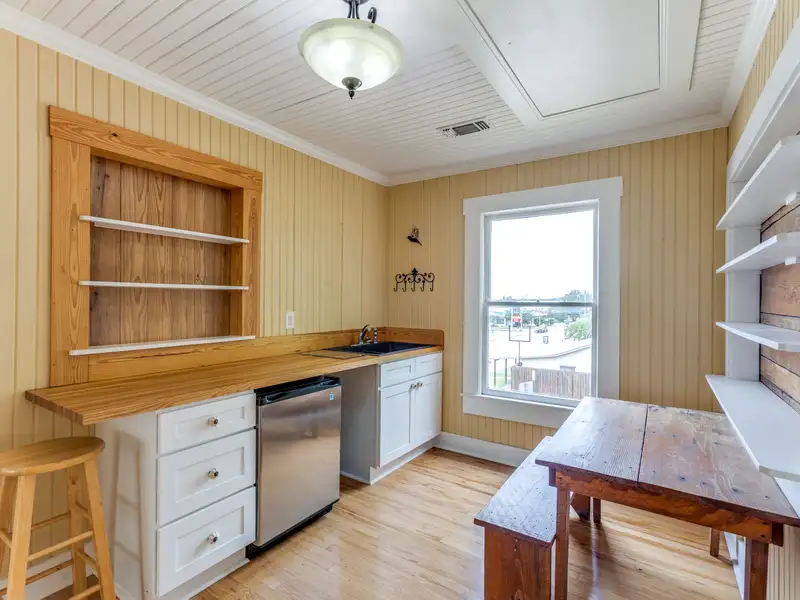 Historic Two-story Commercial Building with Garage Loft Apartment in Prime Location