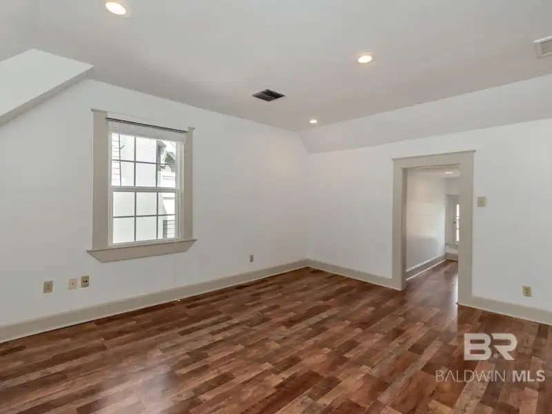 Mixed-use Property in Downtown Mobile, Alabama with High Ceilings and Hardwood Floors