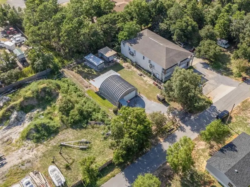 30x30 Enclosed Quonset Building with Pole Barn and Storage on Hwy 98