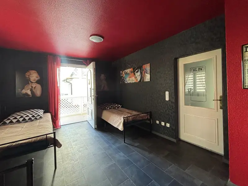 Modernized Detached House with Commercial Space in Family-friendly Location