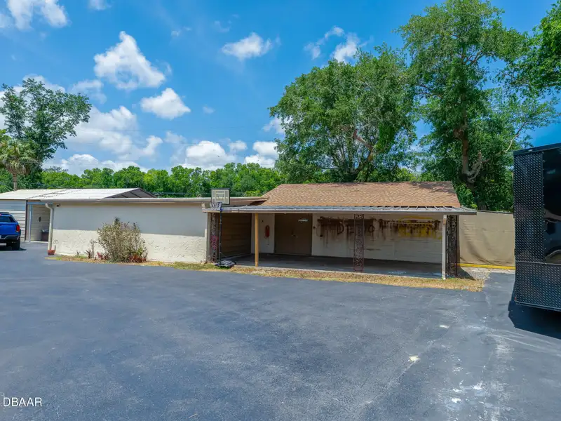 Mixed Use Property: Light Industrial Lot with Adjoining Residential Home and Expansion Potential