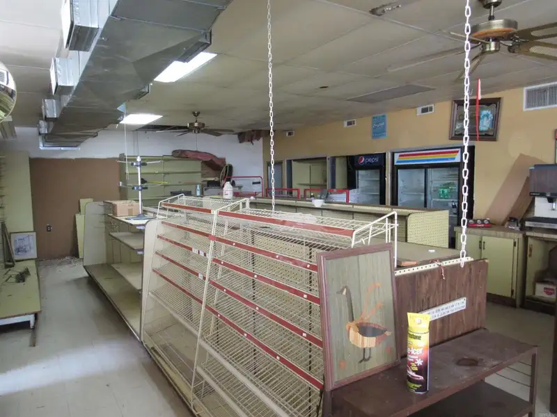 Versatile Commercial Property Near County Fair Grounds with Gas Station and Retail Potential