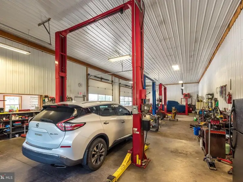 Auto Repair Shop with Residential Income Opportunity in Prime Location