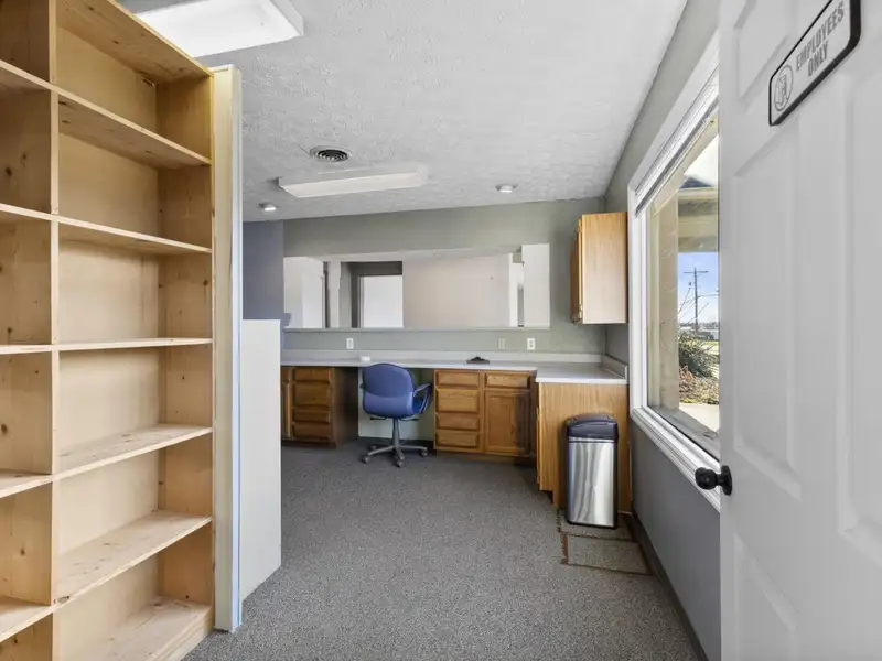 Versatile 4,305 Sq Ft Office Building with Apartment on Highway 11e