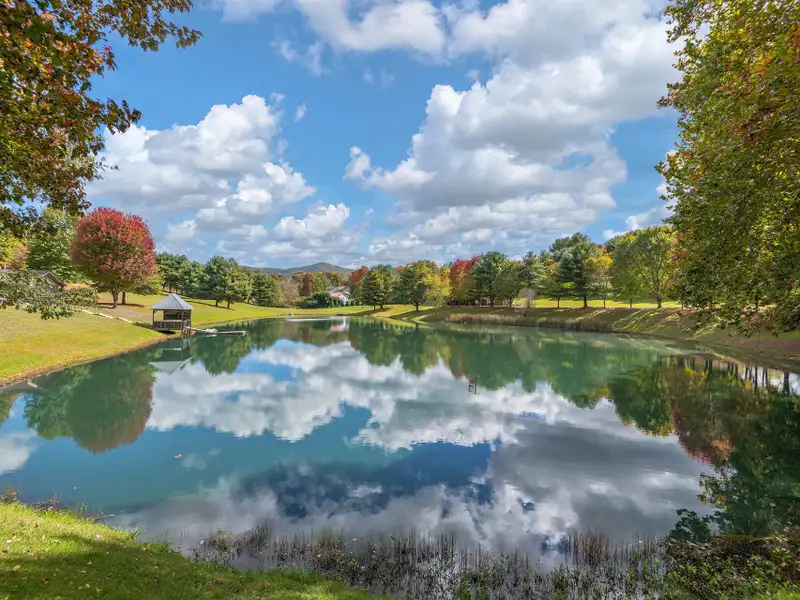 Multi-use Property on 16+ Acres with Home, Barndominium, Pond, and Pool in Western Nc