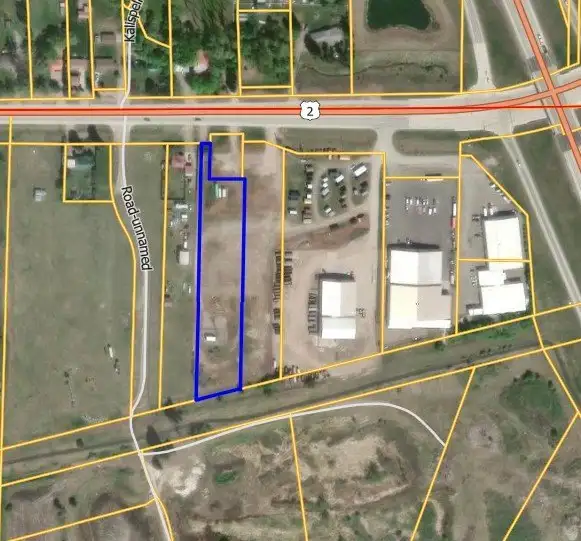 Flexible Development Site with Highway 2 Access and Income-generating Cell Tower