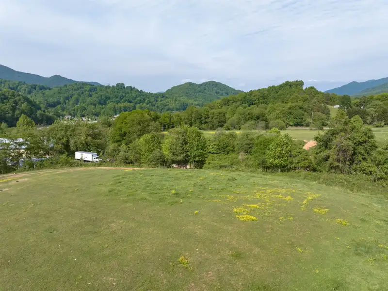 Historic 1918 Stone Building with 3.99 Acres and Detached Workshop in Balsam Road Area