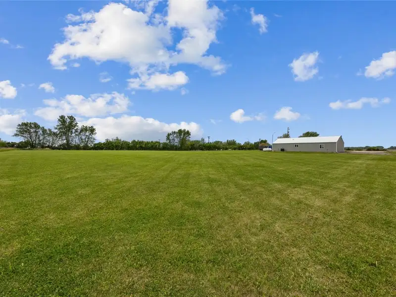 Commercial Building on Highway 20 Near Jesup, Ia with 4 Acres of Potential