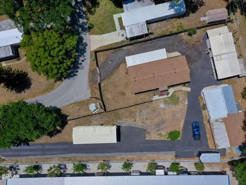 Mixed Use Property: Light Industrial Lot with Adjoining Residential Home and Expansion Potential