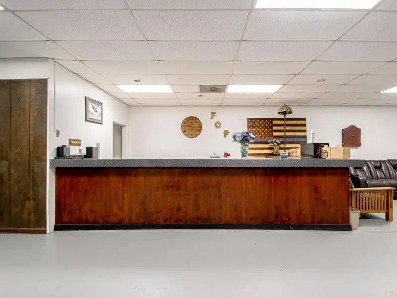 Office Space with Meeting Area, Kitchen, and Security Features in Convenient Location