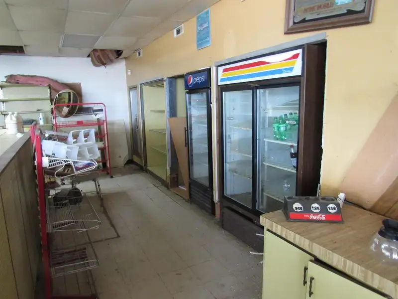 Versatile Commercial Property Near County Fair Grounds with Gas Station and Retail Potential