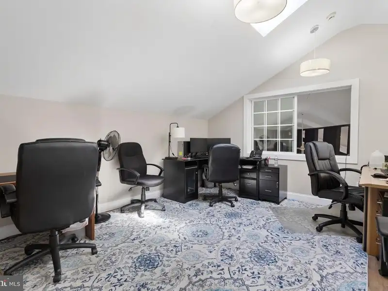 Historic 1921 Office Building in Wallingford with Ample Parking and Strong Investment Potential