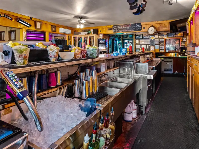 Historic Del's Bar & Grill: Profitable Lakeside Business in Somers, Mt with Liquor License