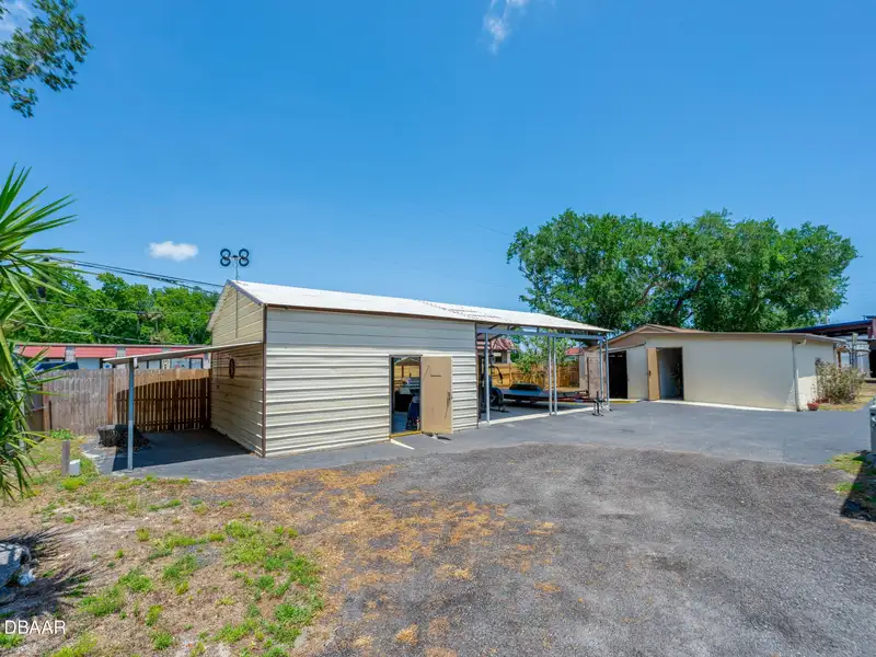 Mixed Use Property: Light Industrial Lot with Adjoining Residential Home and Expansion Potential