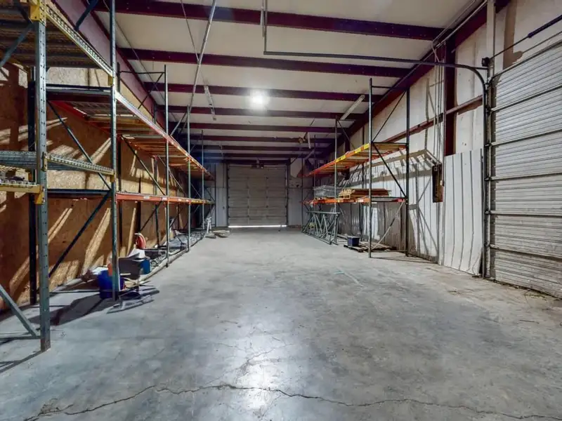 Commercial Property on Busy Highway - 2.1 Acres, 31,000 Sq Ft with Offices and Roll-up Doors