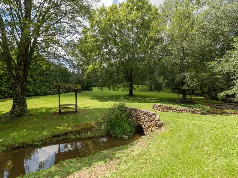 Versatile 5+ Acre Property with Event Center and Lake in Western North Carolina