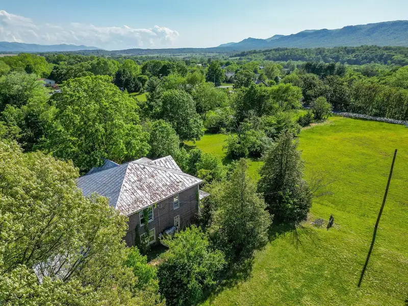 Classic American Foursquare Home in Need of Restoration with Detached Garage