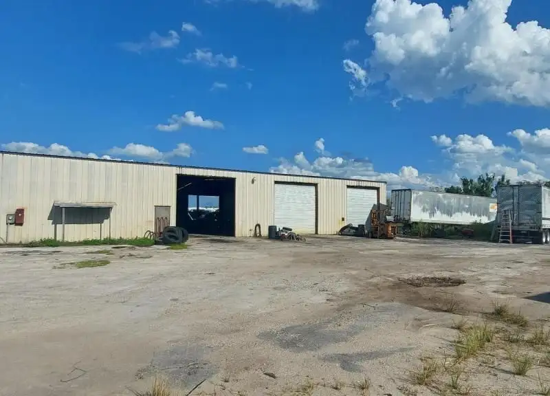 10.94-acre Commercial Property with 7,500 Sq Ft Warehouse on State Rd 46 Frontage