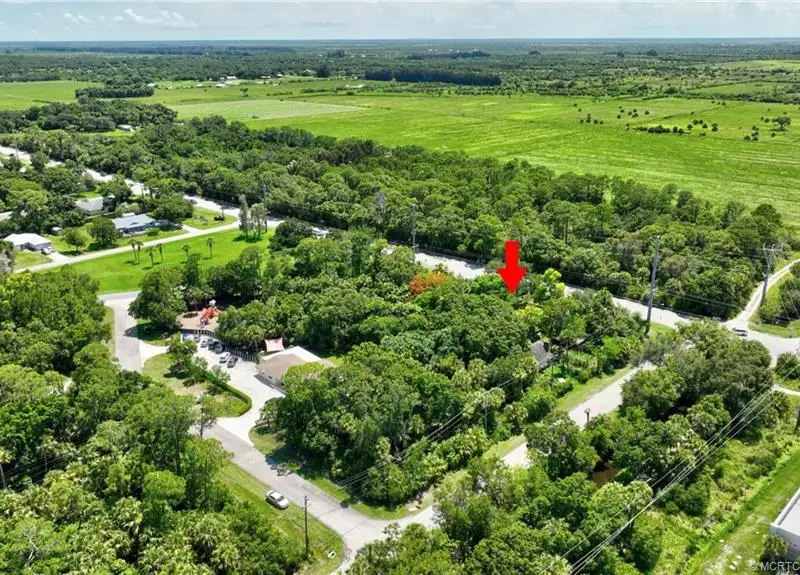 Commercial Corner Lot with Existing Residence in Lakewood Park, 31,140 Sq Ft