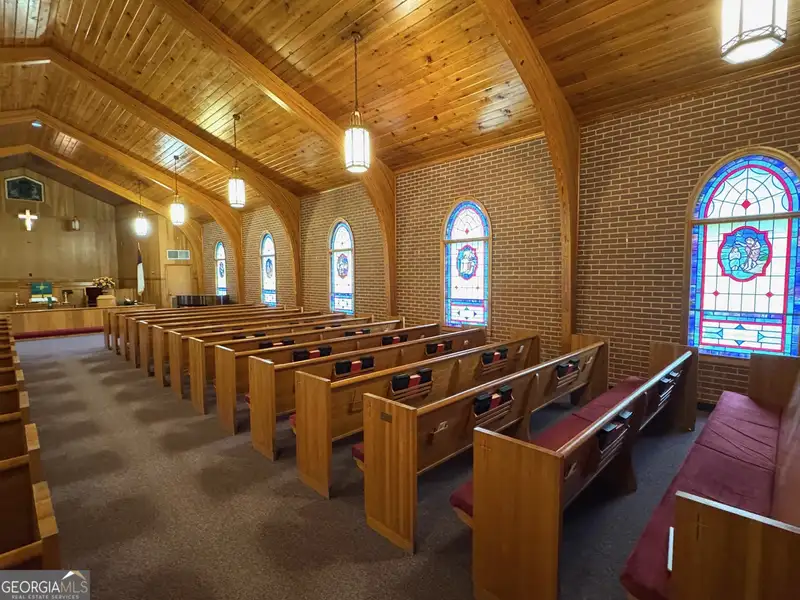 Multi-use Church Property with Sanctuary, Classrooms, Fellowship Hall, and Ample Parking