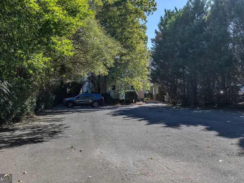 Versatile Commercial Building Near Downtown with Parking and Apartment Potential