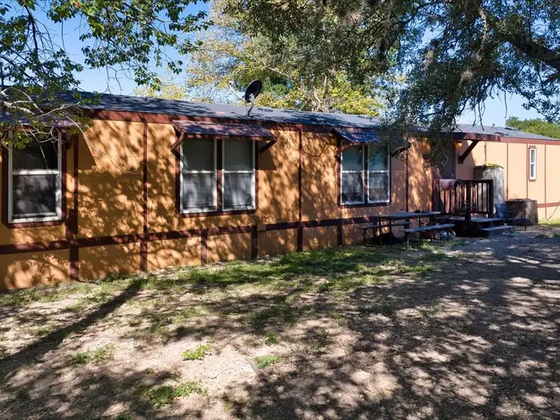 10-acre Mobile Home Community with 5 Units, Fenced, Workshop, and Growth Potential